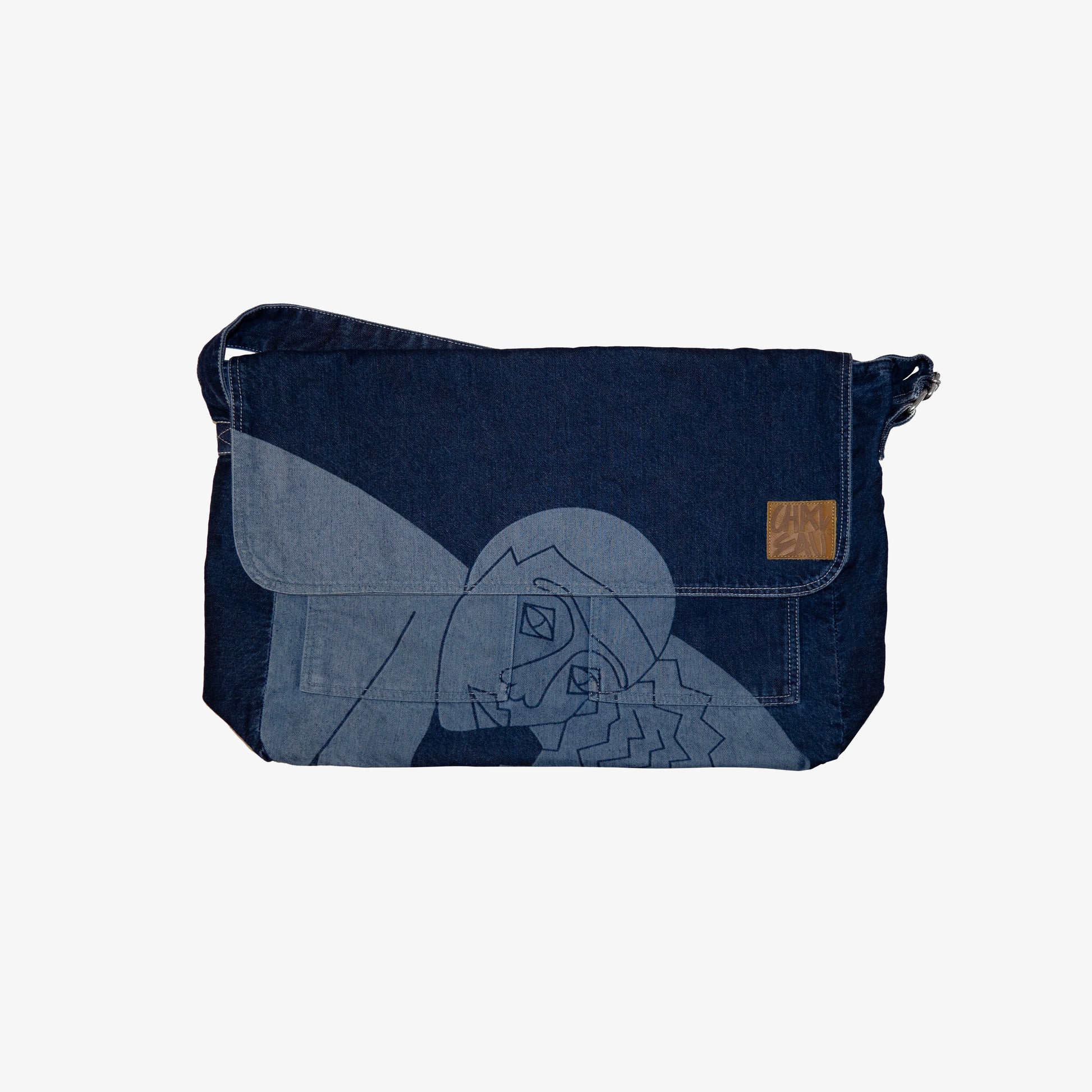 sac grand format avec bandoulière en jeans denim graphique à motif artistique et original. Sac pratique grande contenance.