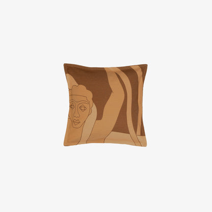 Le coussin marron caramel