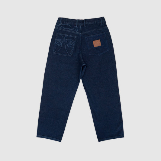 Pantalon 4P denim indigo avec détails laser haute définition au dos et vignette signature. Atelier Chazeau, marque française de streetwear premium mixte.