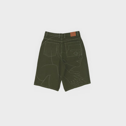 Short kaki avec dessin imprimé au laser haute définition sur tout le dos. Toile 100% coton teint en pièce. Surpiqûres gros fil ton sur ton.